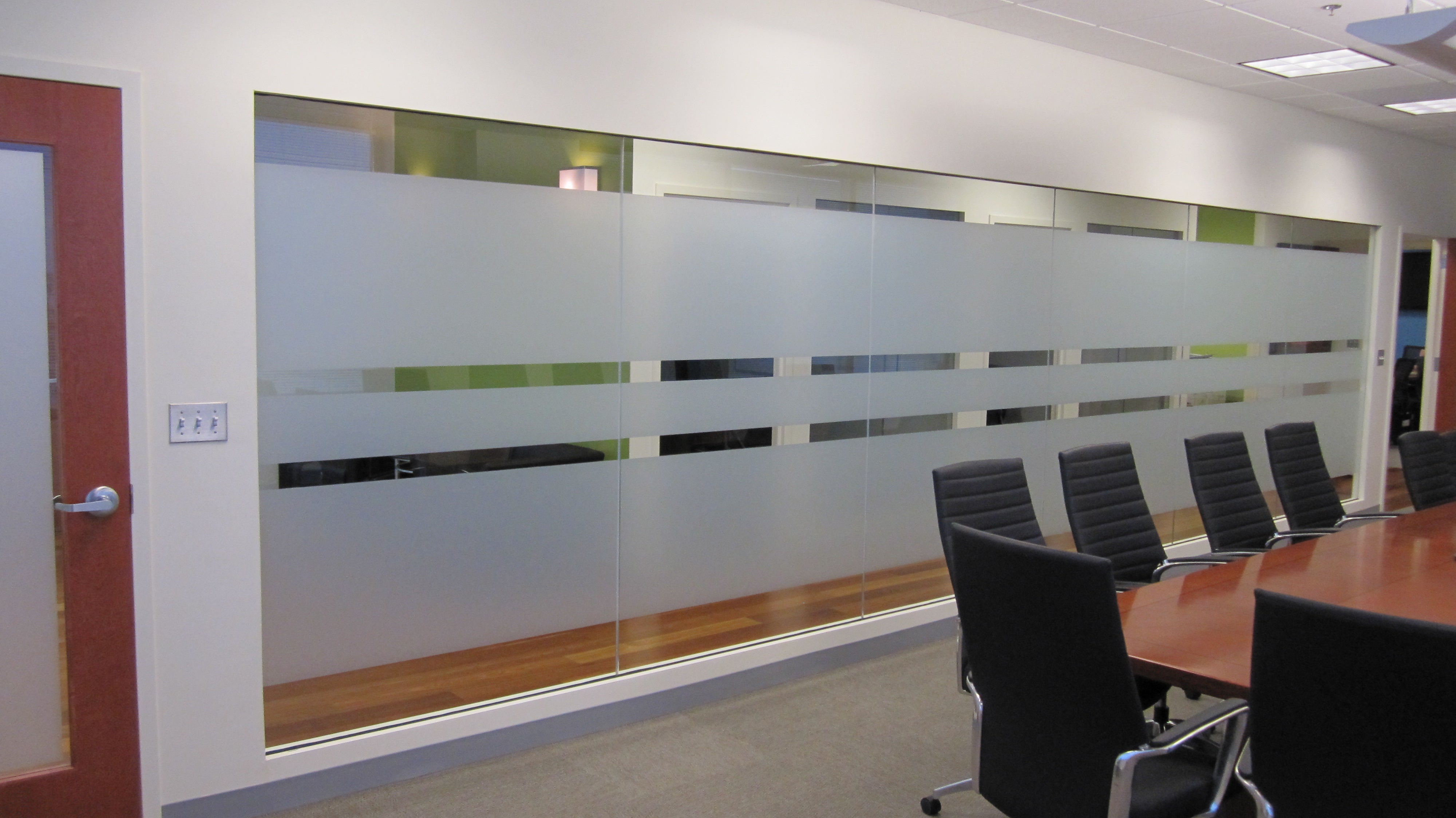Window decals privacy film installed on an office partition