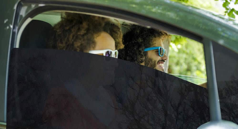 Dark car window tint installed on front windows