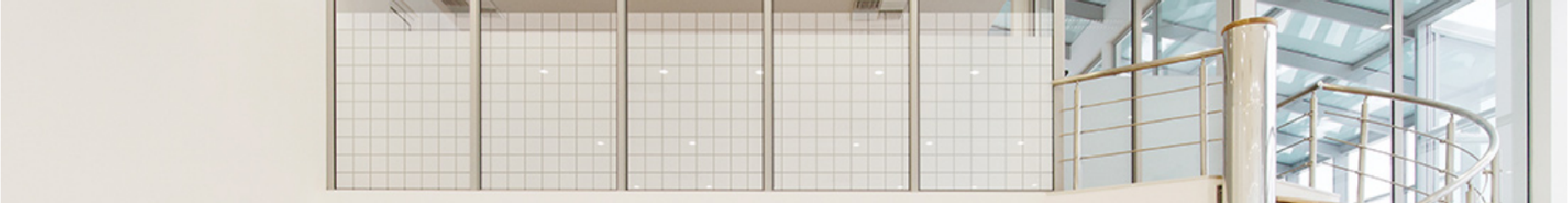 Modern office building with block window film installed on the balcony