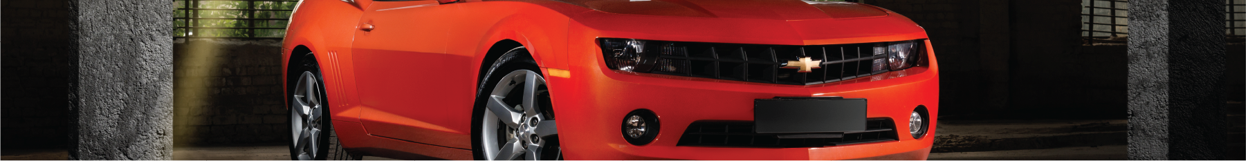 Orange Camaro with Chevrolet window tint installed