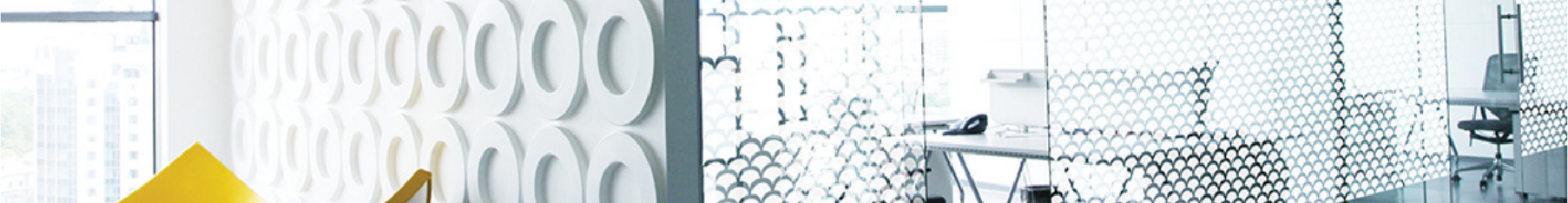 Modern office interior with decorative circle window film fitted