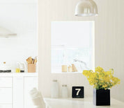 Close-up photo of Cover Styl' Light Grey Oak Grain Vinyl Wrap installed