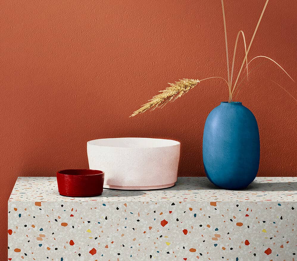 Close-up photo of Cover Styl' White And Multicolored Stone Plaster Vinyl Wrap installed