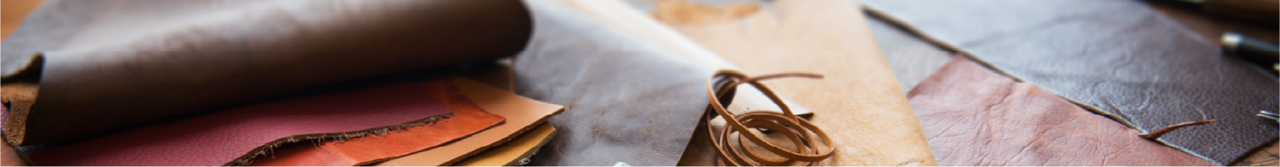 Close-up of leather samples on a table to represent Cover Styl' leather vinyl wrap