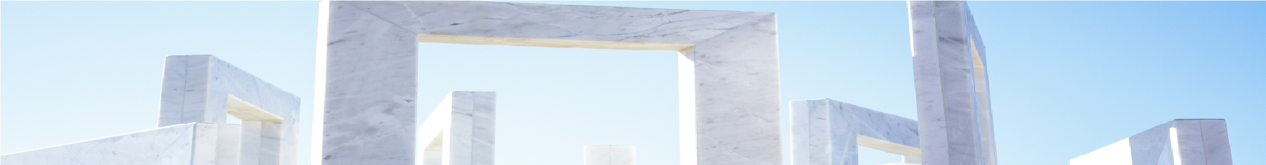 Modern architectural structure against a clear blue sky to represent Cover Styl' marble vinyl wrap