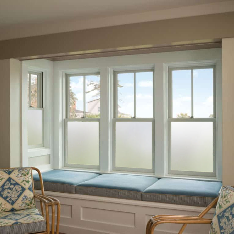 Frosted window vinyl installed on the lower windows in a modern living room