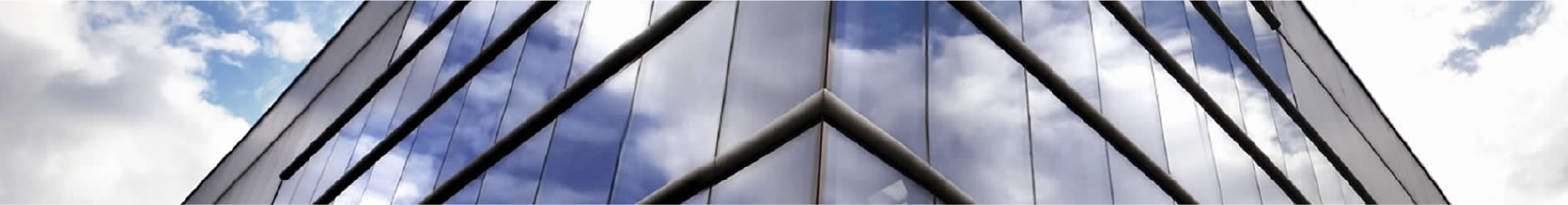 One way window film is installed on a modern buildingwith blue sky refelcted off the front