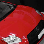 Close-up of a car with Oracol Gloss Cardinal Red installed