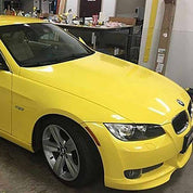 Oracal Gloss Crocus Yellow BMW car in a garage