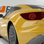 Close-up of a Gloss Maize Yellow Maserati car with a visible brand logo 