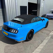 Oracal Gloss Fjord Blue convertible car parked in front of a building