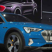 Close-up side view of a car with Oracal Gloss Fjord Blue installed