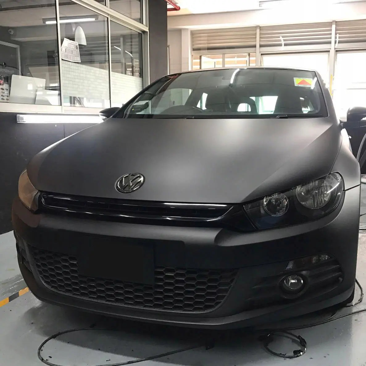 VW Golf with a full Oracal super matt black vehicle wrap installed