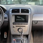Jaguar car interior with Oracal carbon fibre wrap installed to the surround