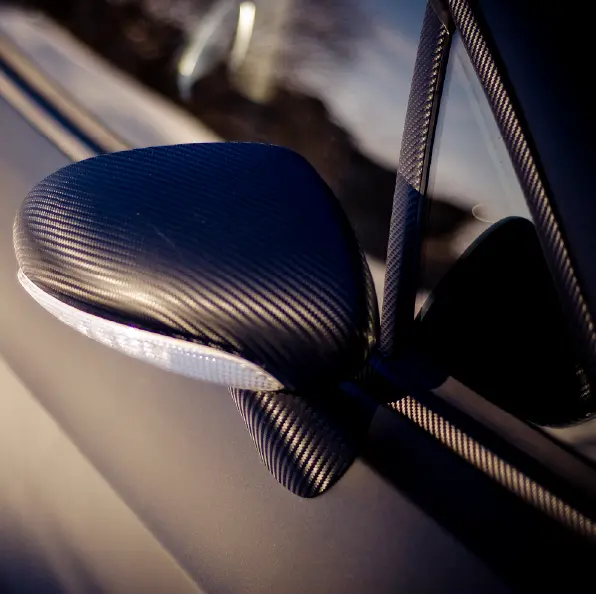 Oracal carbon fibre textured car mirror on a vehicle