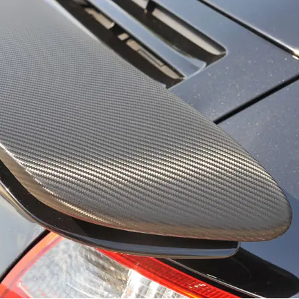 Carbon fiber vehicle wrap on a Porsche spoiler