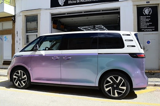 Oracal Gloss Amethyst installed on a car parked in front of a building