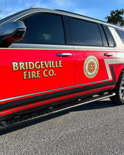 Side view of an Oracal Gloss Chili Red installed on a car