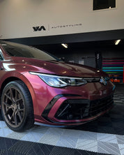 Oracal Gloss Cranberry car on a lift in a garage