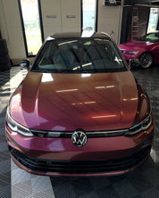 Volkswagen car on display in a showroom with Oracal Gloss Cranberry installed