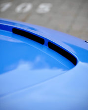 Close-up of an Oracal Gloss Glacier Blue installed on a BMW car