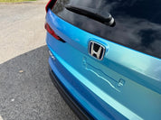 Oracal Gloss Green Blue installed on car parked on a road