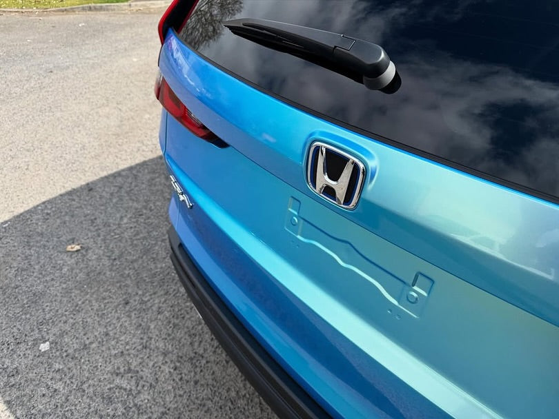 Oracal Gloss Green Blue installed on car parked on a road
