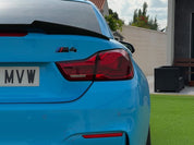 Rear view of BMW car with Oracal Gloss Ice Blue installed