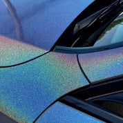 Close-up of a car's hood with Oracal Gloss Intergalactic Blue installed