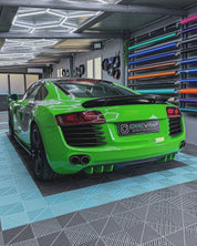 Audi car in a garage with an Oracal Gloss Lawn Green wrap installed