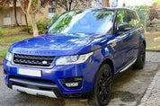 Oracal Gloss Light Navy on Range Rover parked on a street with a residential background