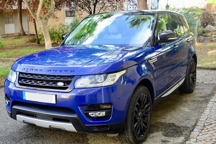 Oracal Gloss Light Navy on Range Rover parked on a street with a residential background
