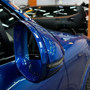 Close-up of an Oracal Gloss Night Blue Metallic ultra close-up car mirror