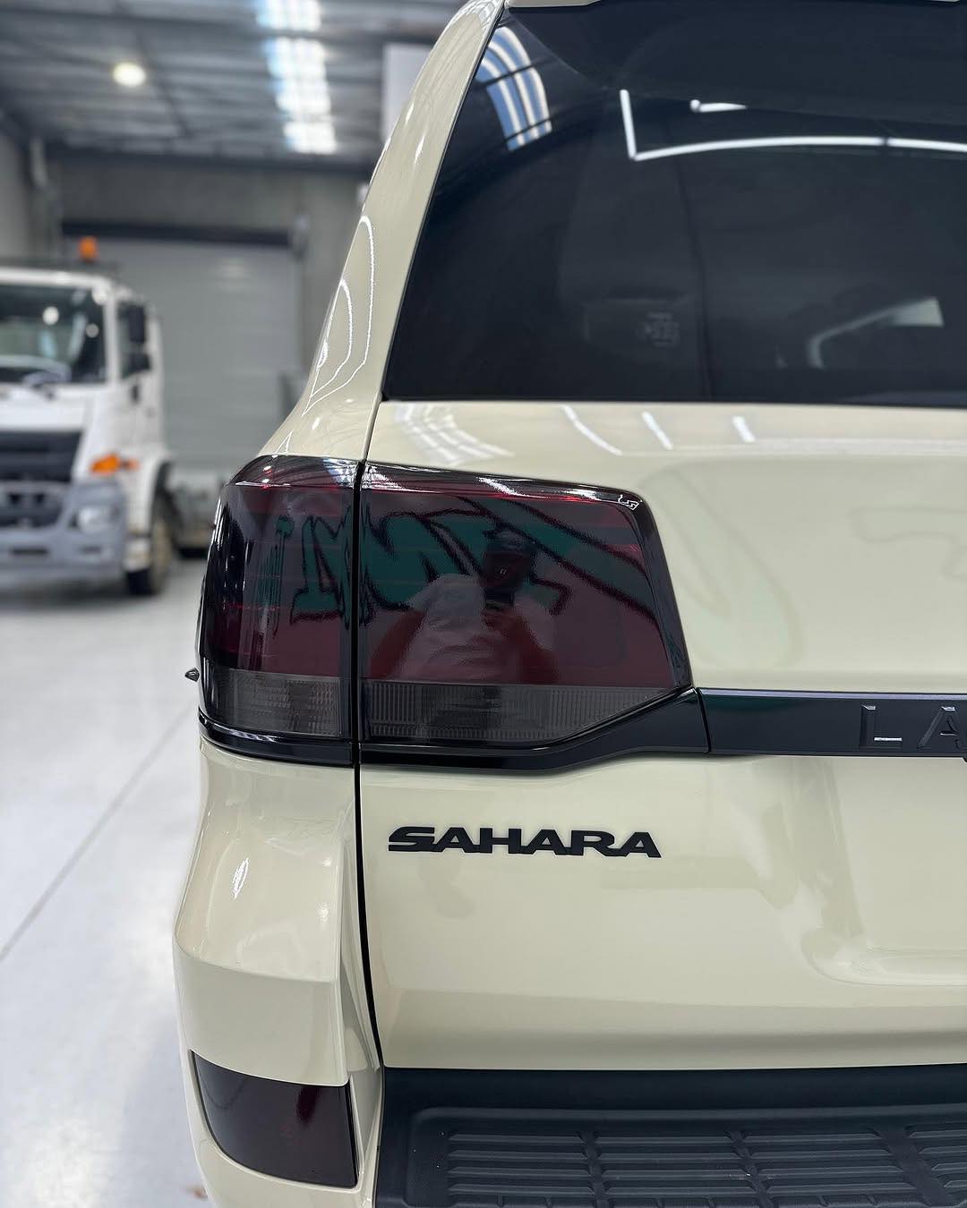 Back of an Oracal Gloss Papyrus vehicle parked in a garage