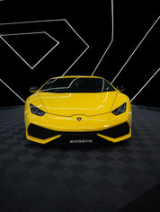 Oracal Gloss Traffic Yellow on Lamborghini with a black checkered floor and geometric white lines 