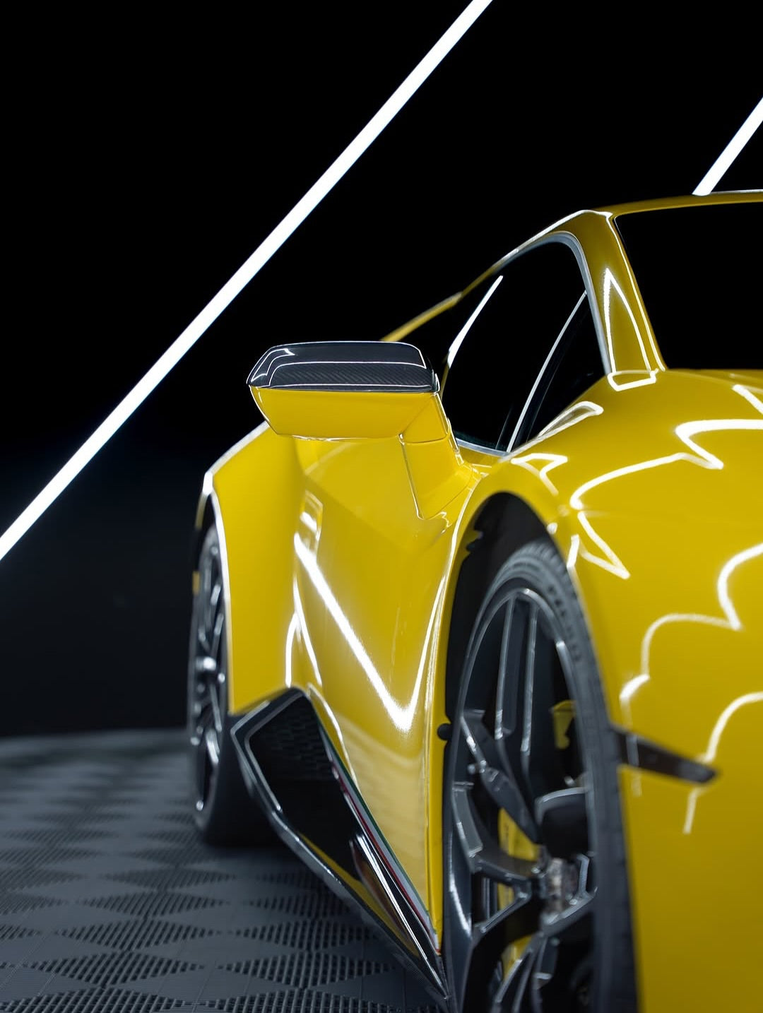 Lamborghini on a black background with white lines, and Oracal Gloss Traffic Yellow installed