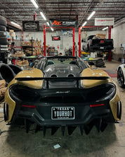 Oracal Gloss Turquoise Lavender sports car with a custom license plate in a garage 