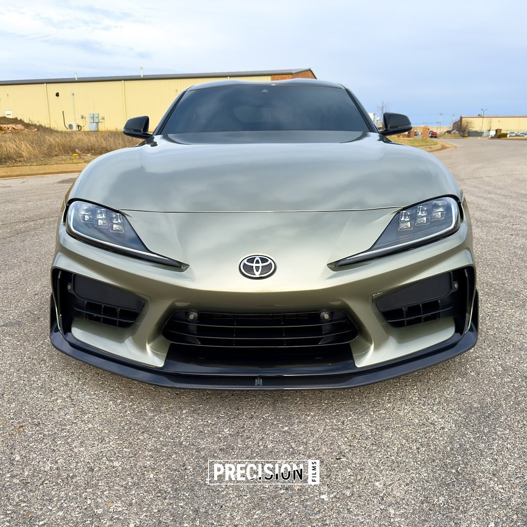 Front view of a Toyota car on a paved surface with Oracal Gloss Zinc Metallic installed