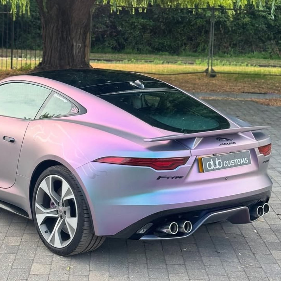 Oracal Matte Amethyst  installed on a Jaguar car, parked on a paved surface