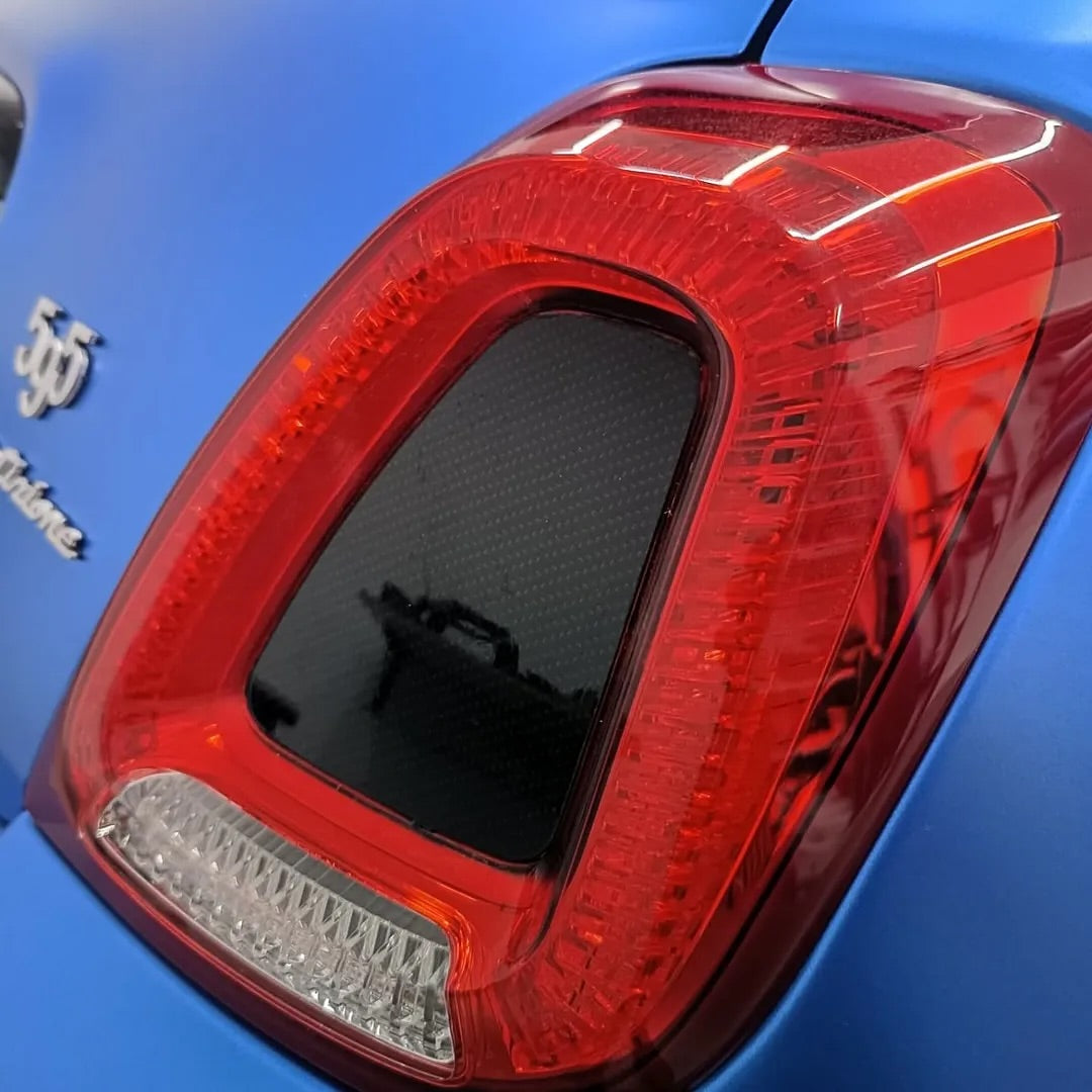 Close-up of a car tail light with Oracal Matte Azure Blue Metallic wrap installed