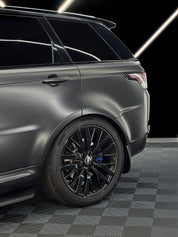 Oracal Matte Black installed on SUV with black wheels on a checkered floor