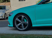 Close-up of an Oracal Matte Mint installed on a car parked on a street
