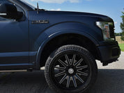Close-up of an Oracal Matte Moonlight Metallic wrap installed on a Ford truck's front wheel and fender