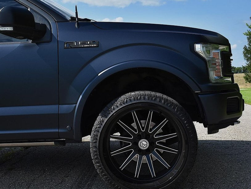Close-up of an Oracal Matte Moonlight Metallic wrap installed on a Ford truck's front wheel and fender