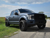 Oracal Matte Moonlight Metallic wrap installed on a Ford truck parked on a road with grass and trees