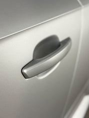 Oracal Matte Silver Grey Metallic installed on a door handle