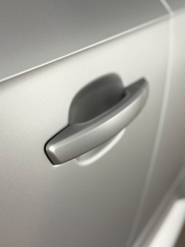 Oracal Matte Silver Grey Metallic installed on a door handle