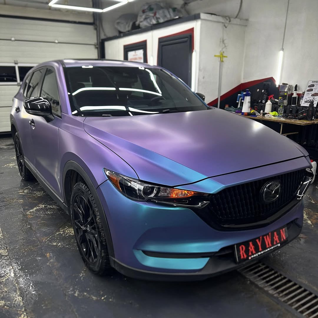 Oracal Matte Ultramarine Violet car parked in a garage