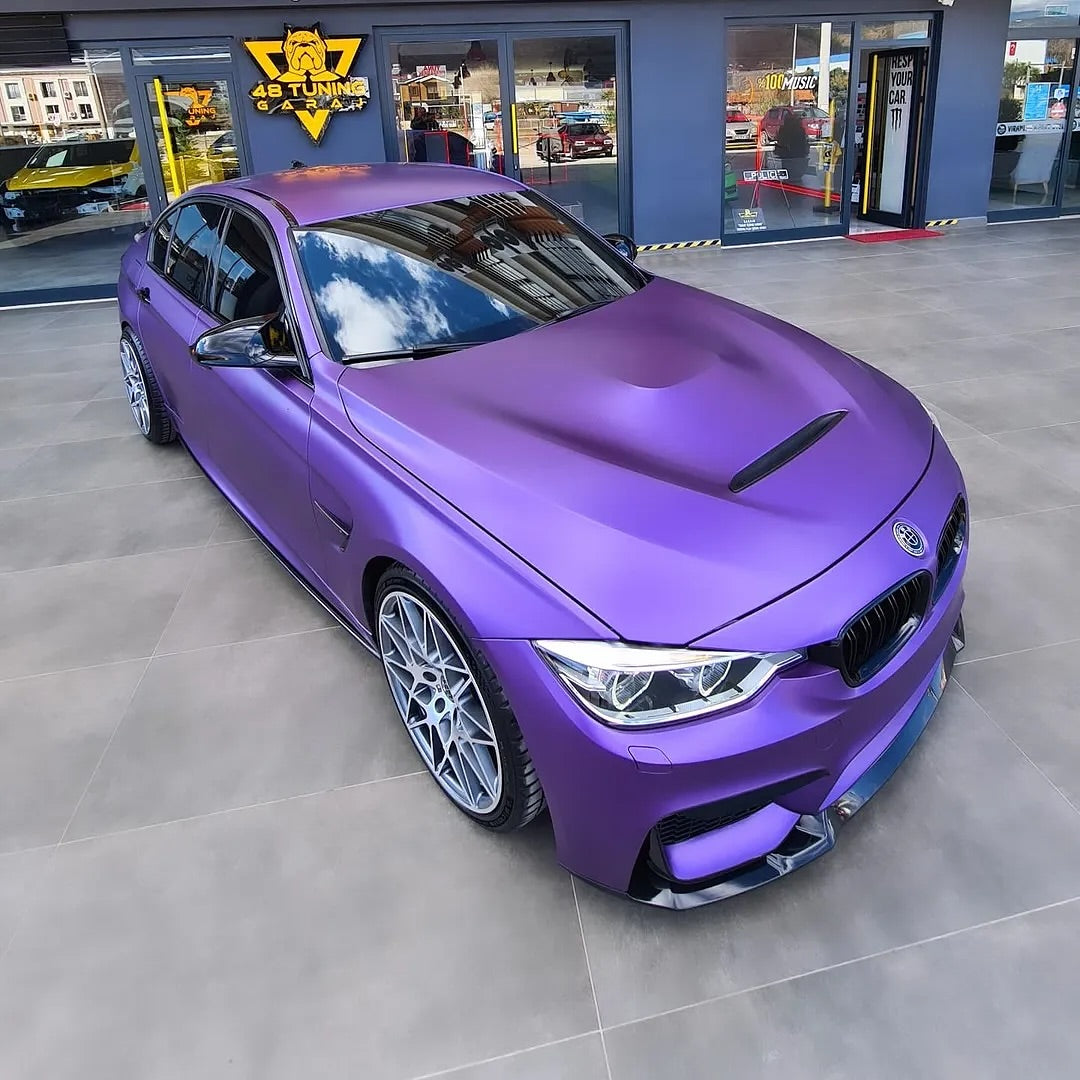 Oracal Matte Violet Metallic BMW car in a showroom