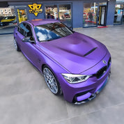 Oracal Matte Violet Metallic BMW car in a showroom
